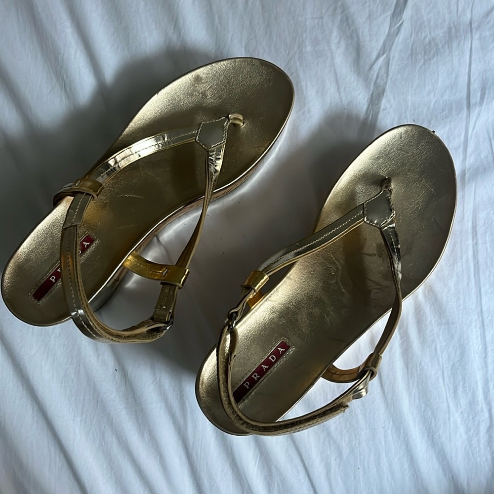 Gold Prada platform sandals